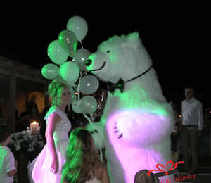 The White Polar Bear came to the wedding to deliver the gift to the bride and groom. Gift Delivery. Wedding gift. Surprise from the Polar bear. White Polar Bear at the wedding.